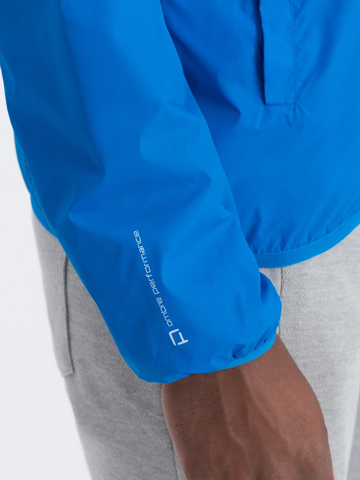 Men's windbreaker jacket with hood and contrasting details - blue V1  OM-JANP-0110