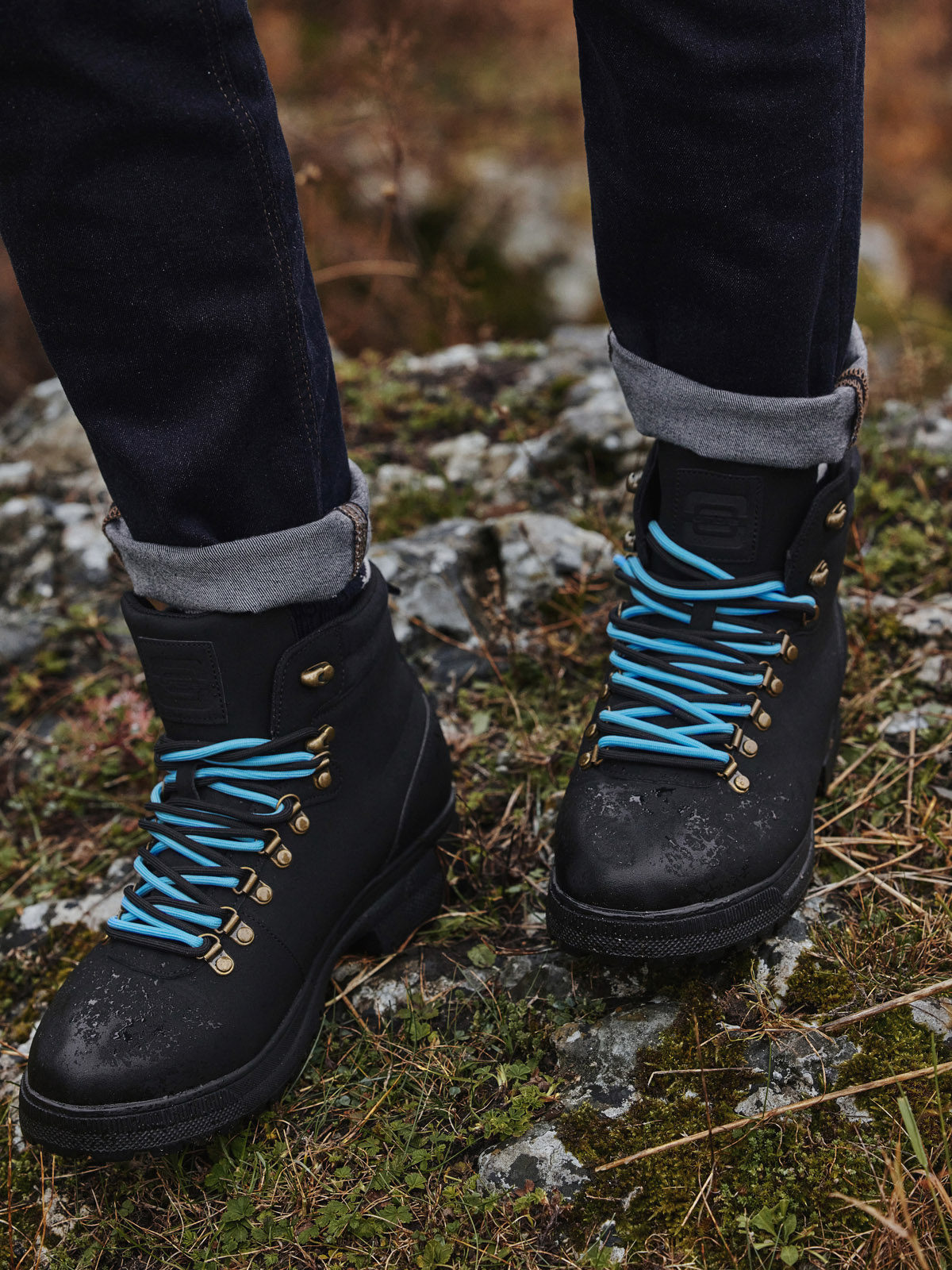 Black boots blue laces hotsell