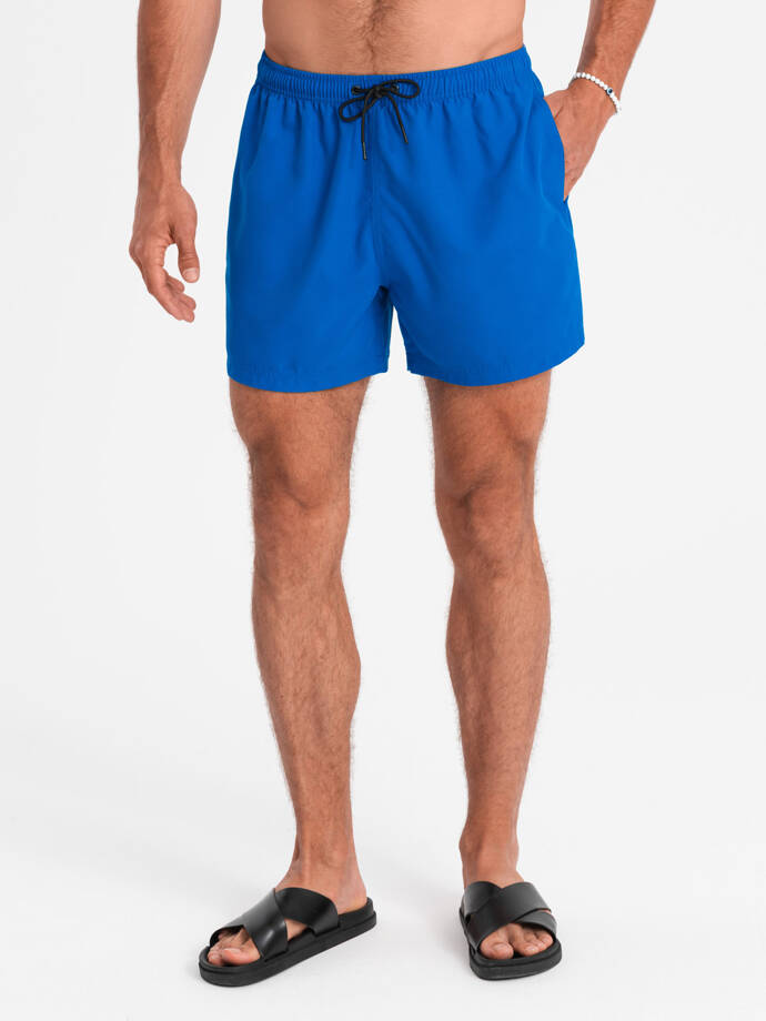 Neon men's swim shorts with magic print effect - blue V3 OM-SRBS-0147