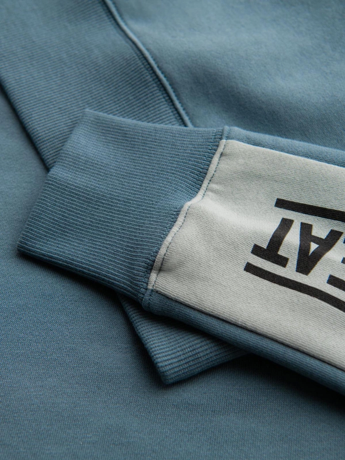 Pánská mikina s kontrastním lemováním a raglánovými rukávy - bělená tyrkysová V4 OM-SSNZ-0200