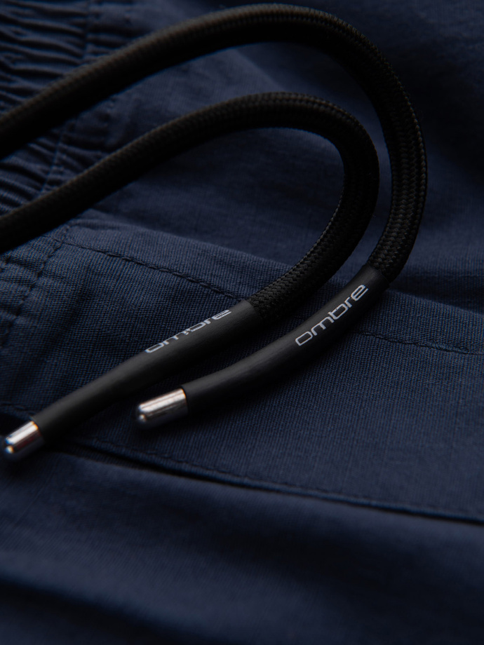 Pantaloni bărbătești JOGGER cu buzunare cargo cu fermoar - albastru marin V5 OM-PAJO-0135