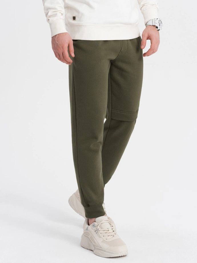 Men's sweatpants with stitching and leg zipper - olive V3 OM-PASK-0147