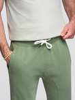 Men's jogger sweatpants - green V3 OM-PABS-0173