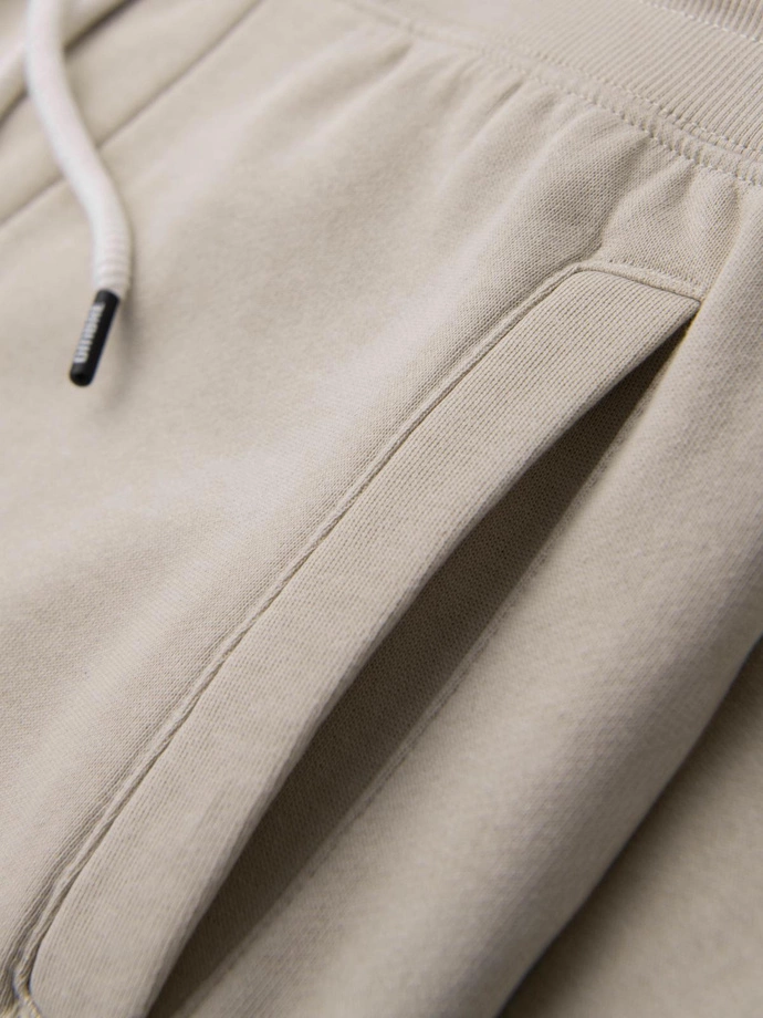Pánské tepláky jogger - světle béžové V1 OM-PABS-0173