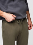 Men's sweatpants with stitching and leg zipper - olive V3 OM-PASK-0147