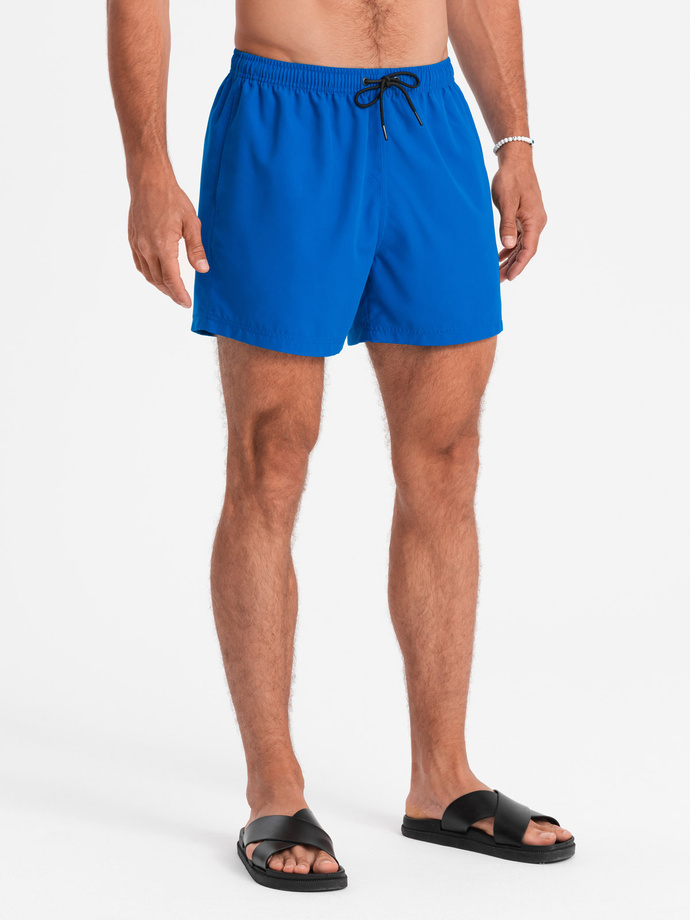 Neon men's swim shorts with magic print effect - blue V3 OM-SRBS-0147