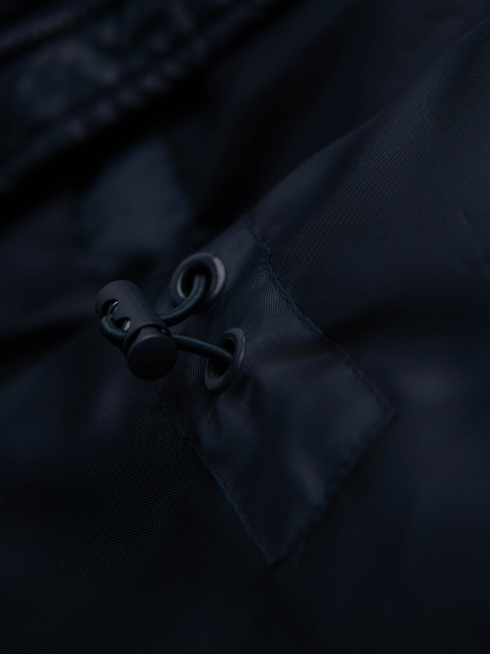 Pánská prošívaná bunda z kombinovaného materiálu s kapucí - tmavě modrá V3 OM-JALJ-0266