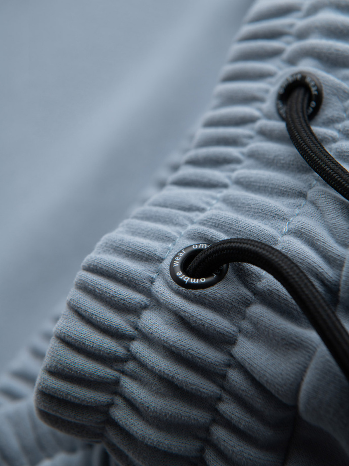 Pánské krátké teplákové šortky s potiskem - světle modré V1 OM-SRSK-0138