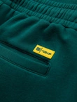 Klasické unisex tepláky s rebrovanými manžetami - tmavozelené V17 OU-PSBC-0100