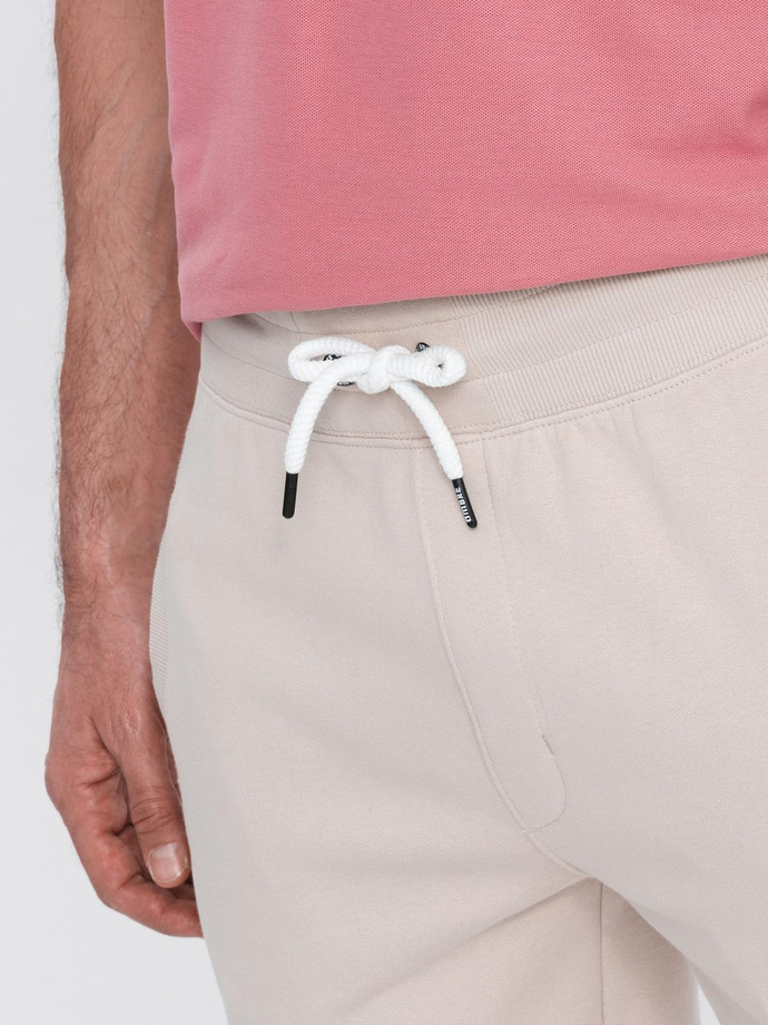 Men's knit shorts with drawstring and pockets - light beige V1 OM-SRBS-0139