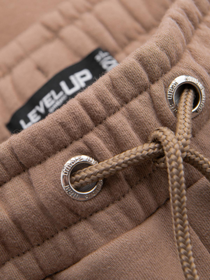 Klasické unisex tepláky s žebrovanými manžetami - hnědé V16 OU-PSBC-0100