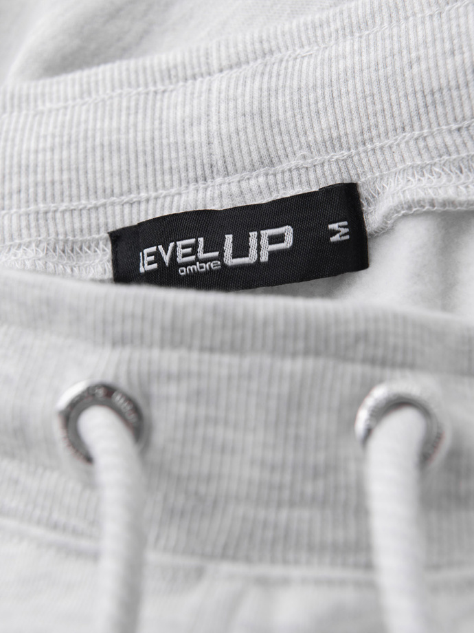 Pánské teplákové šortky s lemováním a žebrovaným pasem - šedý melír V1 OM-SRSK-0156