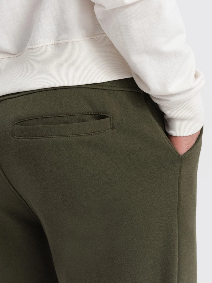 Men's sweatpants with stitching and leg zipper - olive V3 OM-PASK-0147