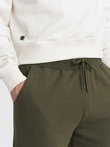 Pantaloni de trening pentru bărbați cu cusături și fermoar pe picior - olive V3 OM-PASK-0147