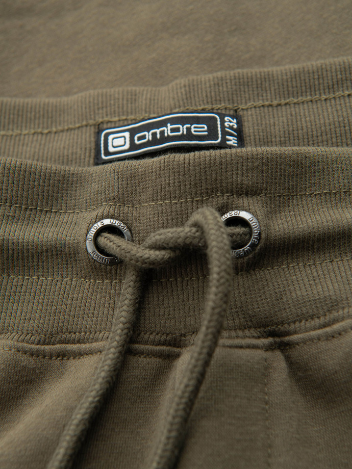 Men's sweatpants with stitching and leg zipper - olive V3 OM-PASK-0147