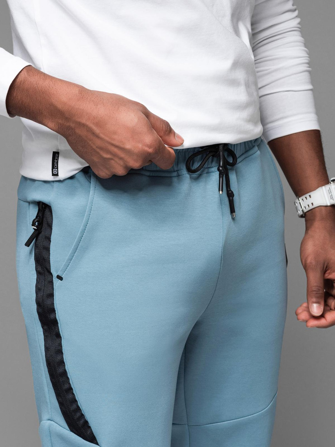 Men's sweatpants with ribbed cuffs and decorative zipper - light blue V4 OM-PASK-0226