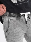 Pánské džínové kalhoty JOGGERS s odřením - světle šedé V4 OM-PADJ-0150