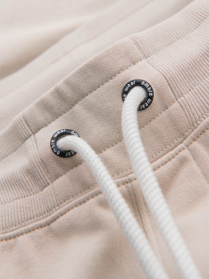 Men's knit shorts with drawstring and pockets - light beige V1 OM-SRBS-0139