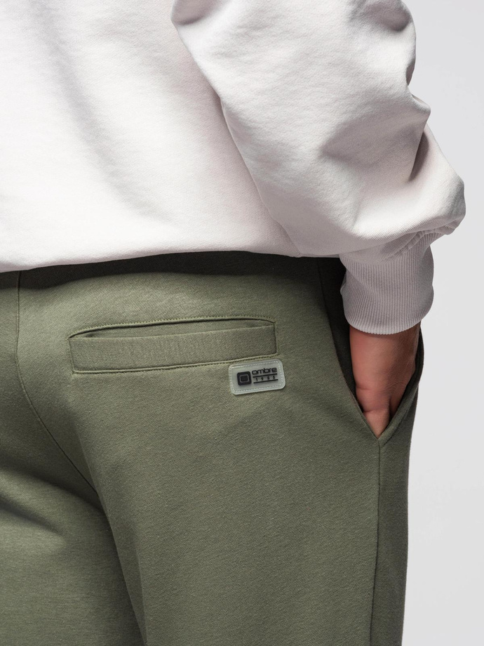 Pánské tepláky joggers - olivové V4 OM-PASK-0280