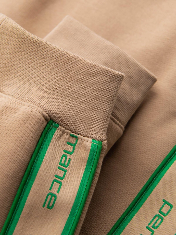 Pánské sportovní kalhoty s lemováním - hnědé V1 OM-PASK-0284