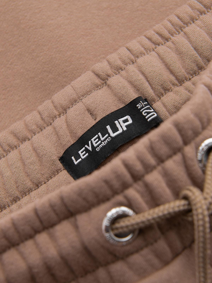 Klasické unisex tepláky s žebrovanými manžetami - hnědé V16 OU-PSBC-0100