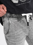 Pánske džínsové nohavice JOGGERS s odieraním - svetlosivé V4 OM-PADJ-0150