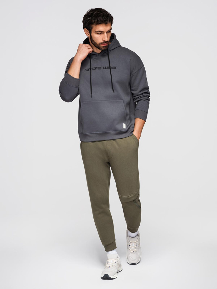 Pantaloni de trening pentru bărbați cu cusături și fermoar pe picior - olive V3 OM-PASK-0147