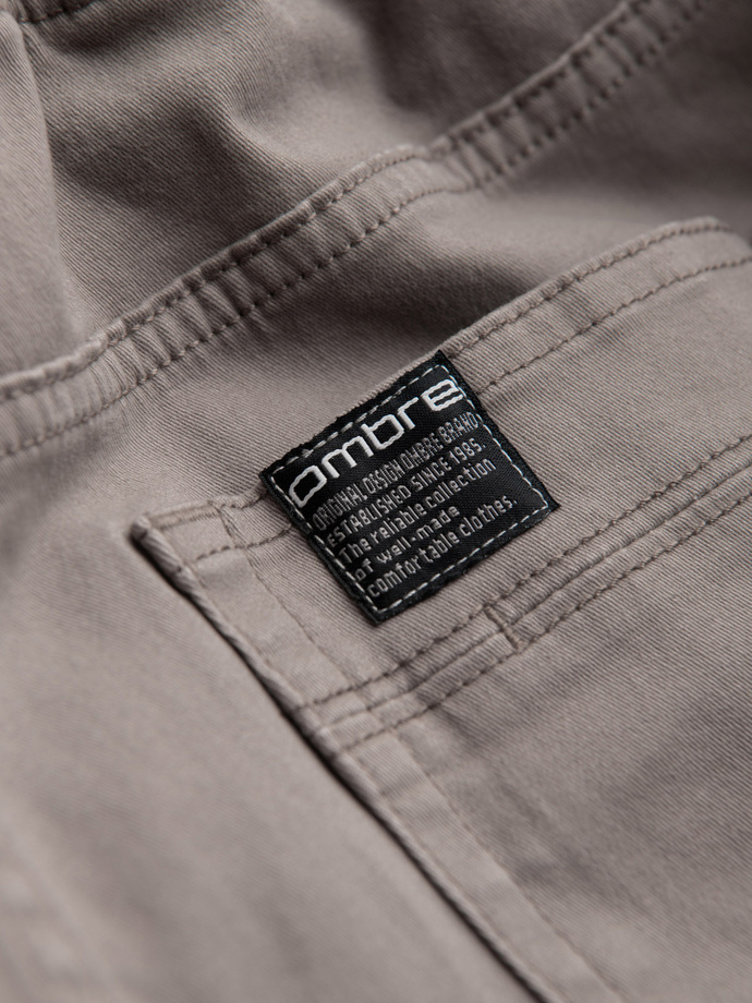 Pánske nohavice JOGGER s cargo vreckami na zips - tmavobéžové V2 OM-PAJO-0125