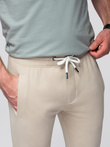Pantaloni de trening pentru bărbați cu picior neacoperit - bej deschis V1 OM-PABS-0206