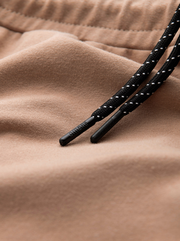 Pánské tepláky s logem - hnědé V3 OM-PASK-0167