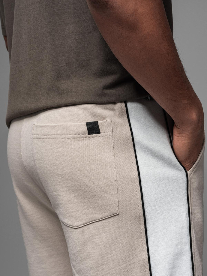 Men's short sweat shorts with wide stripes - beige V2 OM-SRSK-0182