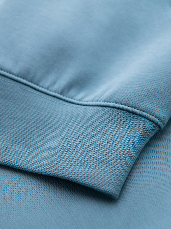 Vyriškos sportinės kelnės su briaunotais rankogaliais ir dekoratyviniu užtrauktuku - šviesiai mėlynos spalvos V4 OM-PASK-0226