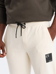 Pantaloni de trening cu logo pentru bărbați - crem V2 OM-PASK-0167