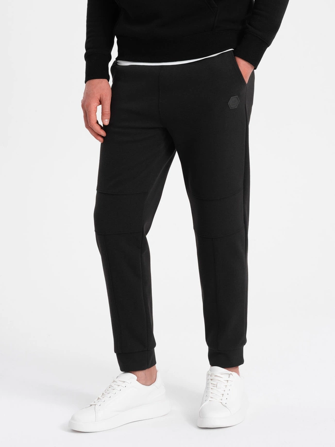 Pantaloni de trening pentru bărbați cu cusături pe picioare - negru V1 OM-PASK-0128