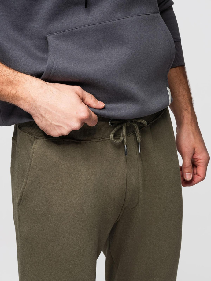 Pantaloni de trening pentru bărbați cu cusături și fermoar pe picior - olive V3 OM-PASK-0147
