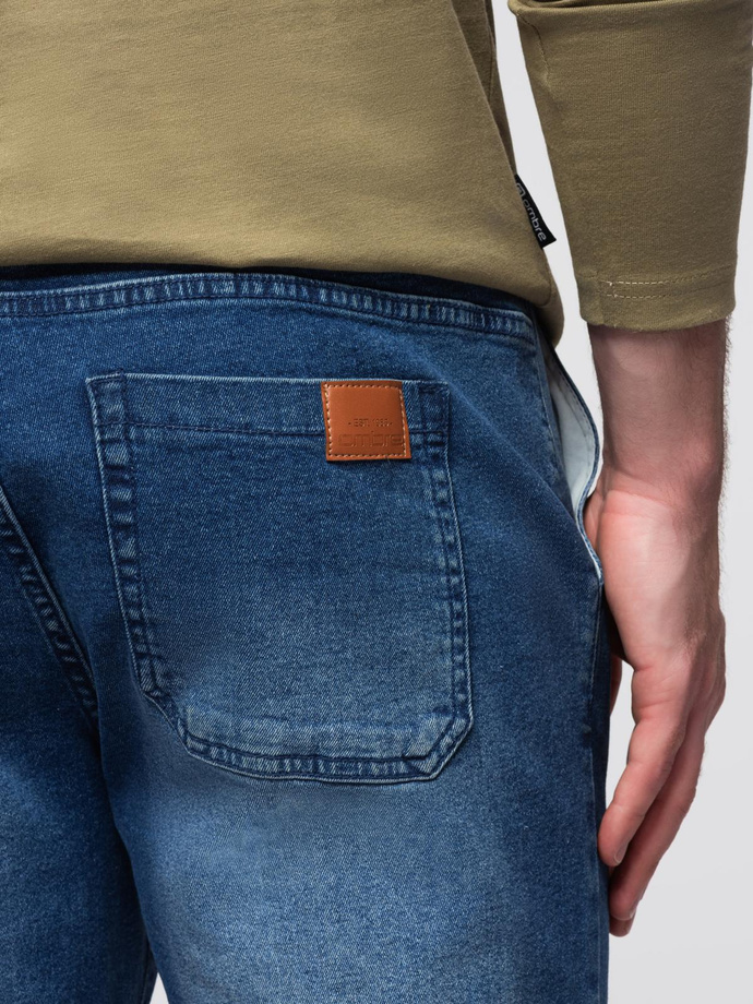 Pánske džínsové nohavice JOGGERS s pracím efektom - modré V2 OM-PADJ-0267