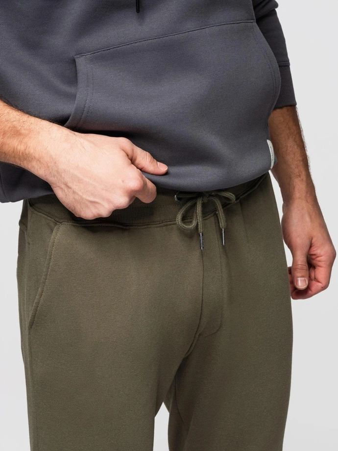 Men's sweatpants with stitching and leg zipper - olive V3 OM-PASK-0147