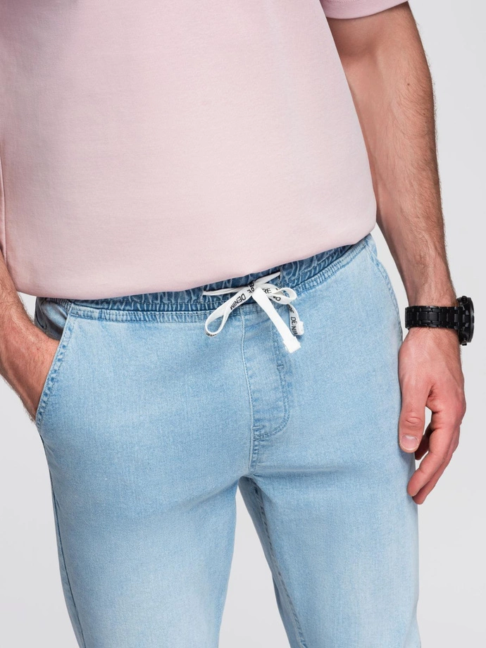 Men's JOGGERS denim pants with wash effect - light blue V1 OM-PADJ-0267