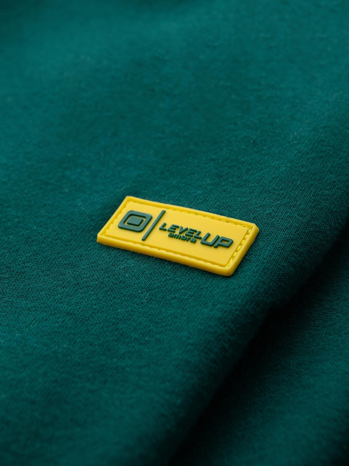 Klasické unisex tepláky s rebrovanými manžetami - tmavozelené V17 OU-PSBC-0100