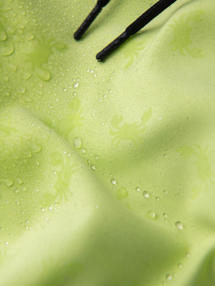 Neon men's swim shorts with magic print effect - lime green V1 OM-SRBS-0147