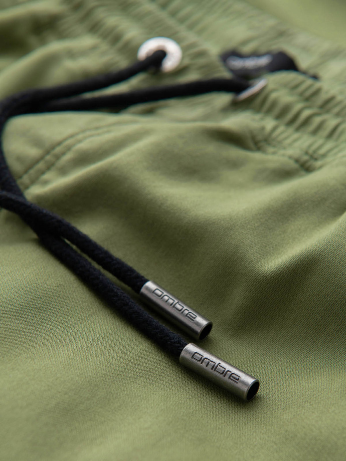 Pánske pletené tepláky s cargo vreckami - olivové V3 OM-PAJO-0199