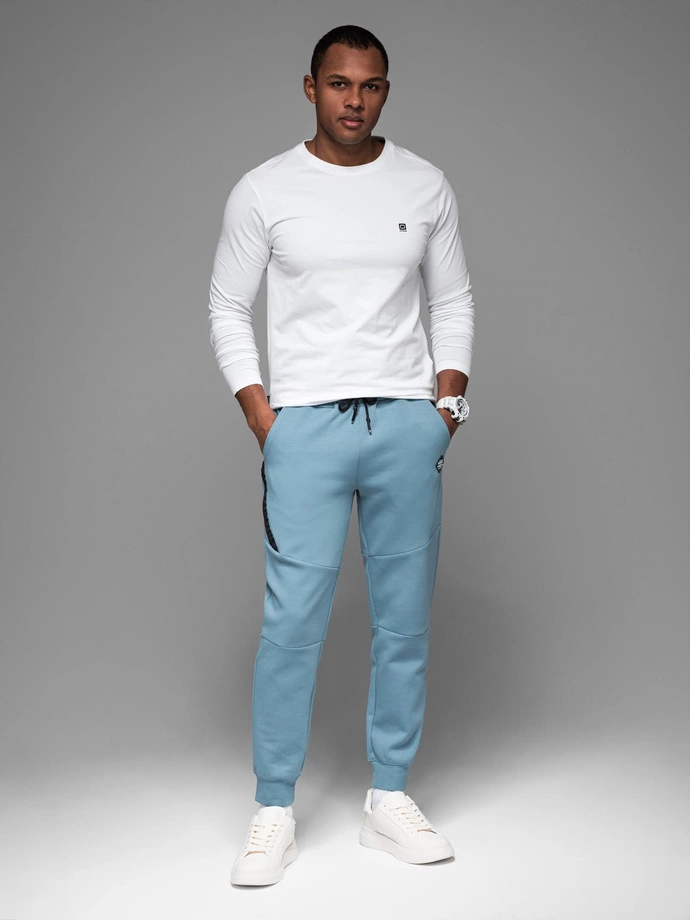 Men's sweatpants with ribbed cuffs and decorative zipper - light blue V4 OM-PASK-0226