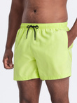 Neon men's swim shorts with magic print effect - lime green V1 OM-SRBS-0147