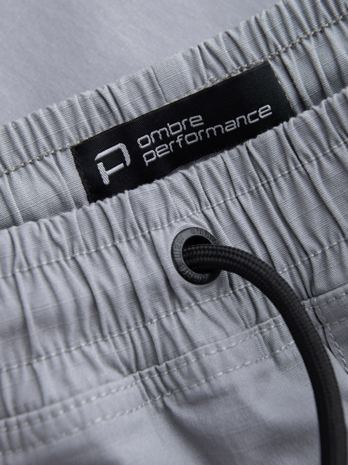 Pantaloni bărbătești JOGGER cu buzunare cargo cu fermoar și fermoar - gri deschis V8 OM-PAJO-0135