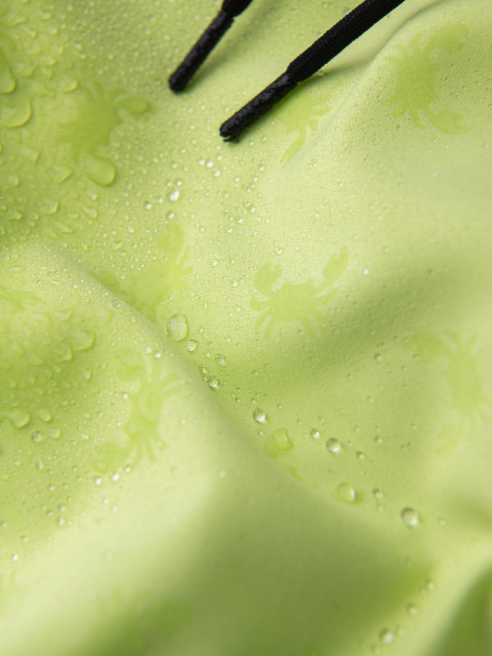 Neon men's swim shorts with magic print effect - lime green V1 OM-SRBS-0147