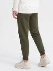 Men's sweatpants with stitching and leg zipper - olive V3 OM-PASK-0147