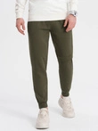 Men's sweatpants with stitching and leg zipper - olive V3 OM-PASK-0147