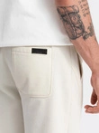 BASIC vyriškos medvilninės sportinės kelnės joggers - kreminės V5 OM-PABS-0174