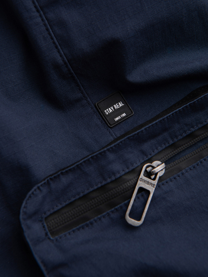Pánske nohavice JOGGER s cargo vreckami na zips - tmavomodré V5 OM-PAJO-0135