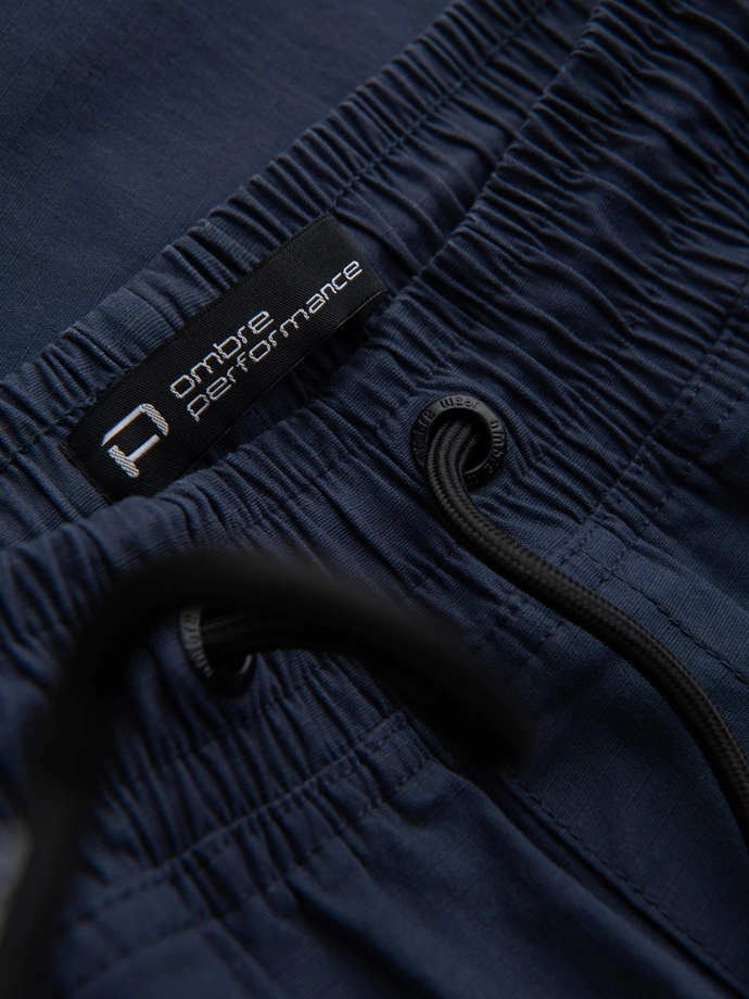 Pánske nohavice JOGGER s cargo vreckami na zips - tmavomodré V5 OM-PAJO-0135